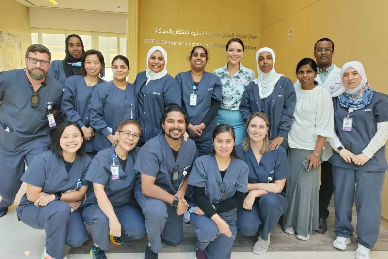 Ms Michelle Razo with hand therapists and occupational therapists at Sheikh Shakhbout Medical City, Abu Dhabi