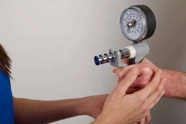 Ms Michelle Razo using a Jamar dynamometer to measure grip strength during a Hand Therapy assessment